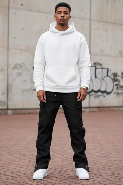 Front-facing angle of model in black cargo pants
