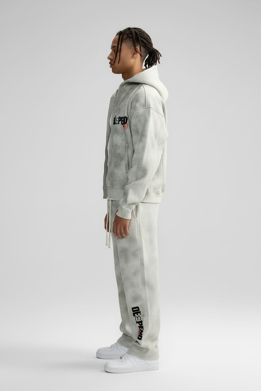 Left side view of model in tracksuit set
