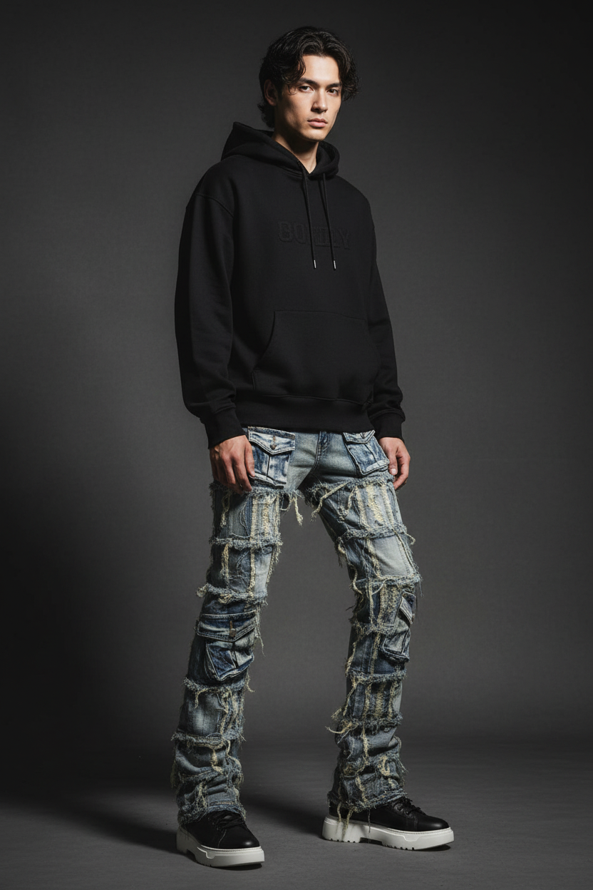 Model wearing distressed cargo jeans