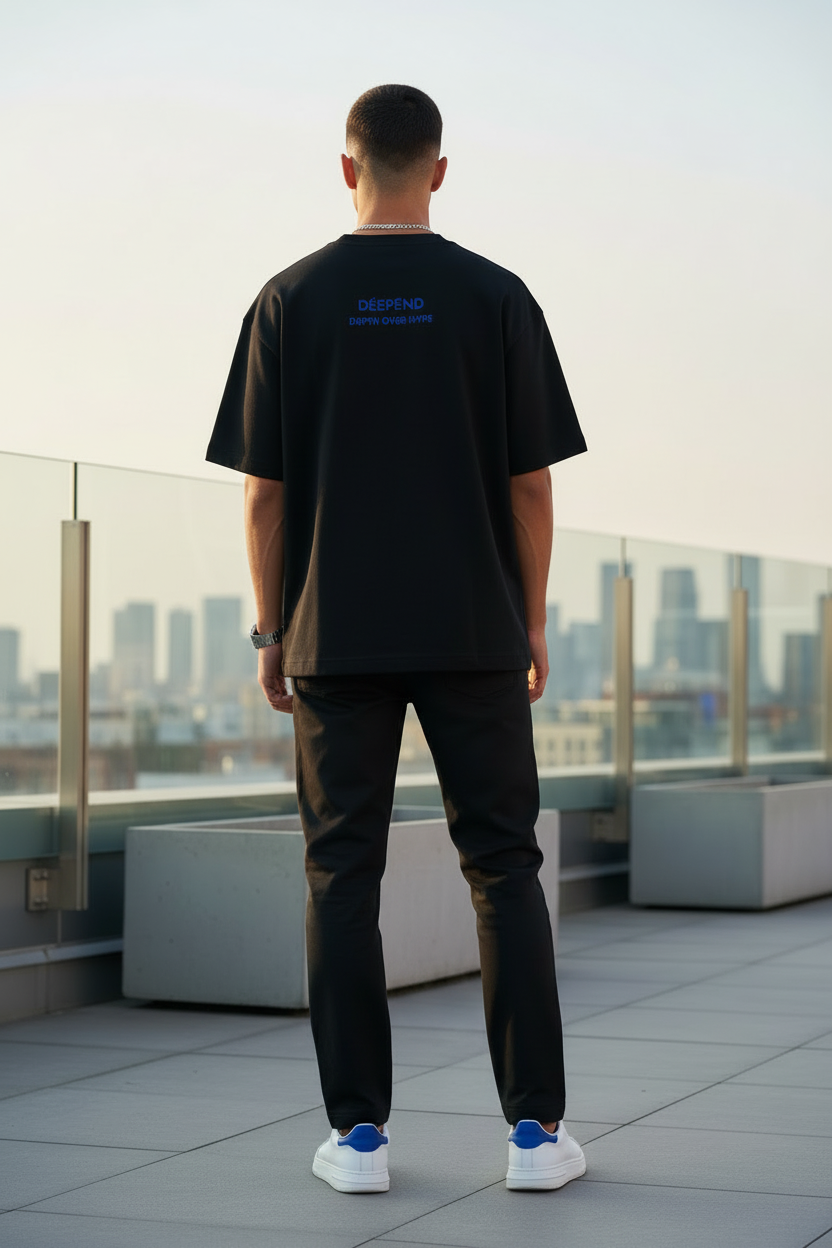 Model with back facing camera on rooftop